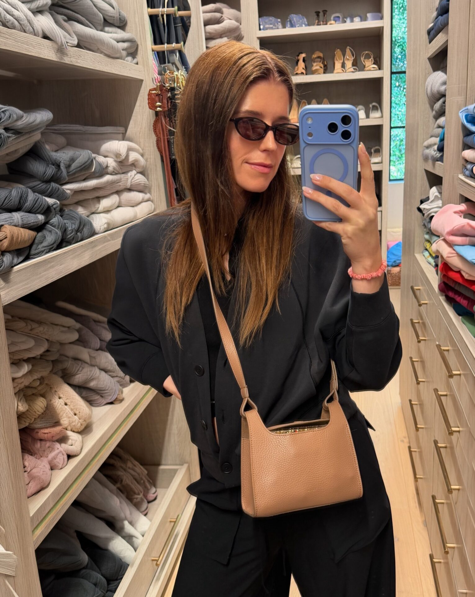 Katherine Schwarzenegger Black Pants + Tortoise Sunglasses