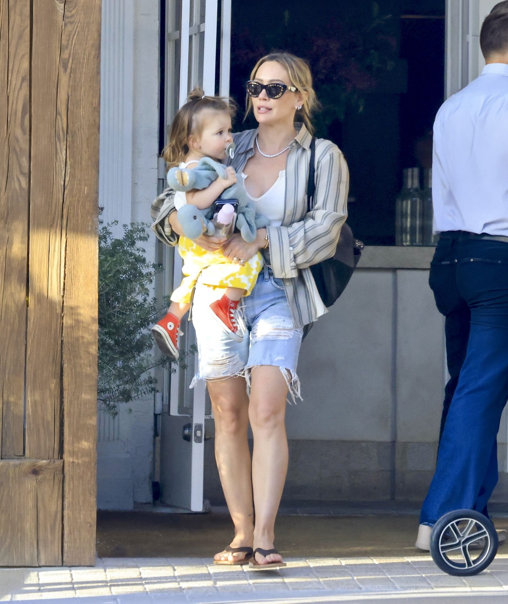 Hilary Duff Beige Stripe Shirt + Black Sunglasses - Los Angeles, CA
