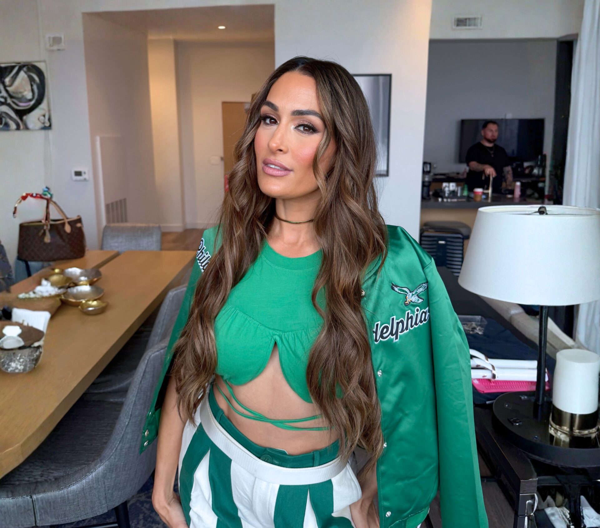 Nikki Garcia Green and Ivory Stripe Pants at Philadelphia Eagles vs Los Angeles Rams Game